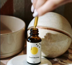 taking a drop of cbd tincture